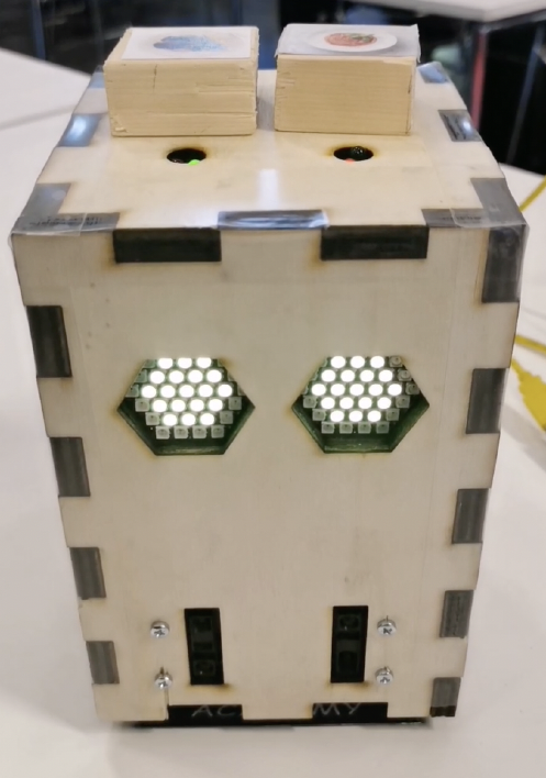 SAM Challenge 2 prototype with white LED eyes showing happy state