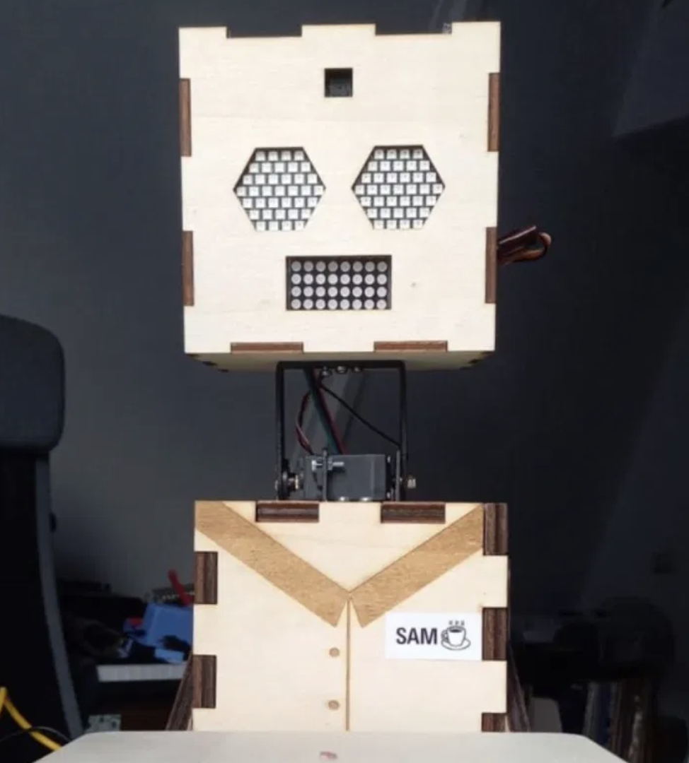 SAM the robot waiter — full wooden laser-cut body with LED eyes, mouth, and serving tray
